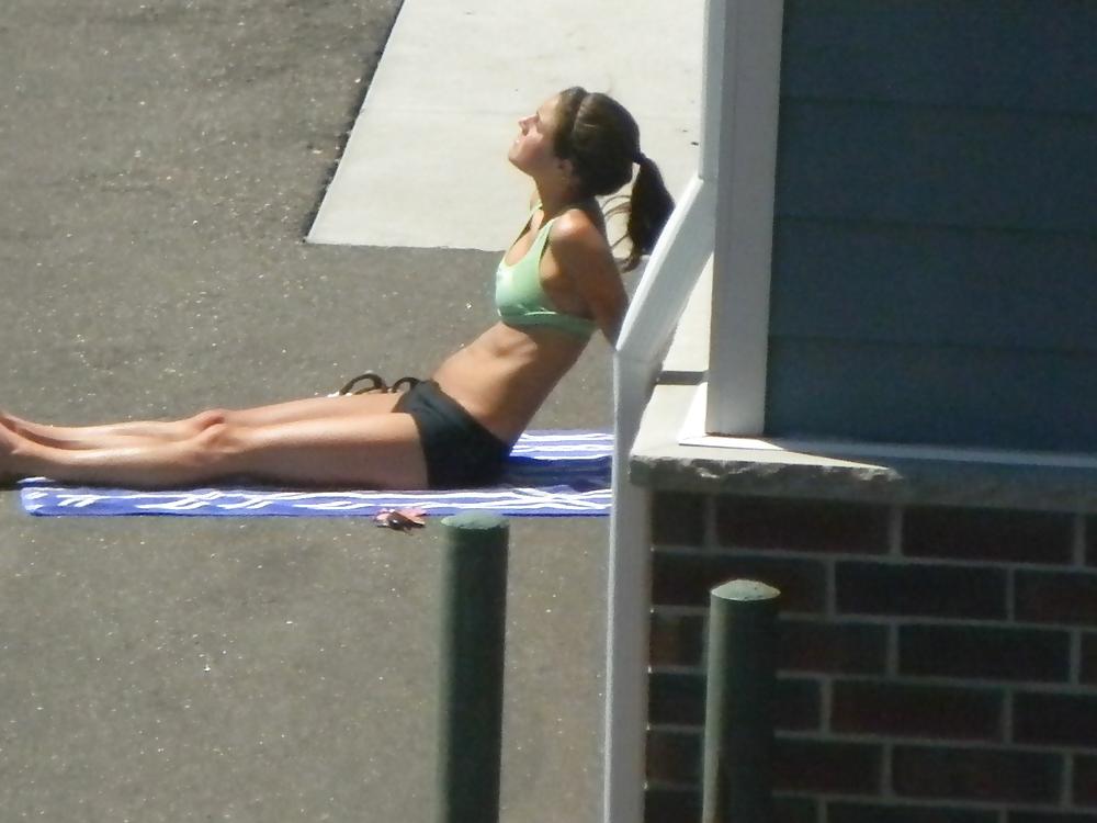 25P Teen flashes her titties sunbathing