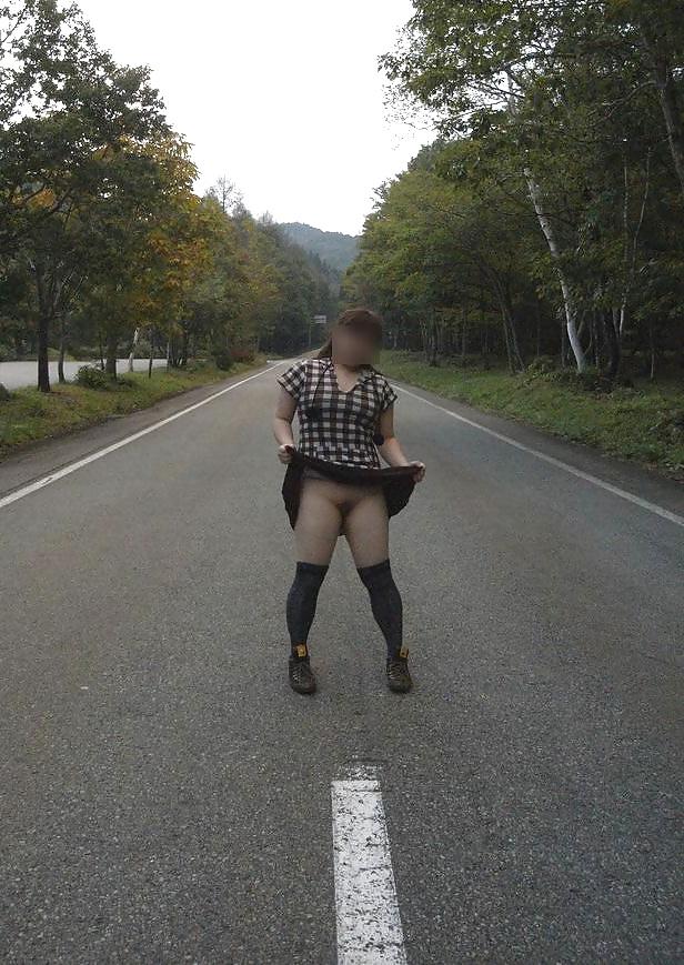 7P She is an exhibitionist's wife in a tourist resort.