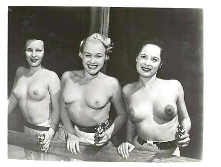25P Three women posing for pictures
