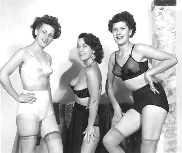 25P Three women posing for pictures