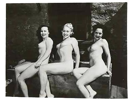 25P Three women posing for pictures