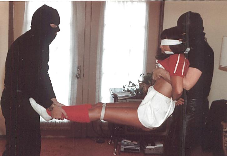 25P Cheerleader wearing white panties stripped and bound.
