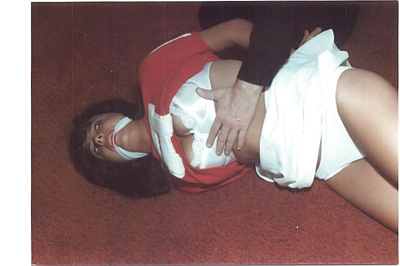 25P Cheerleader wearing white panties stripped and bound.