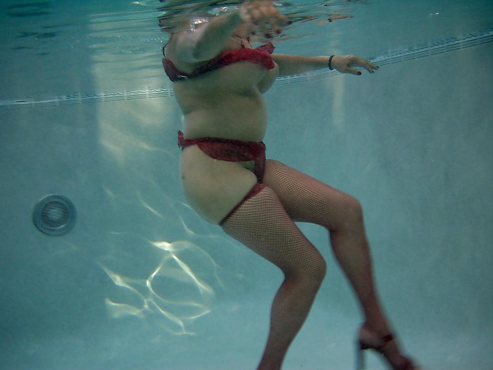8P With high heels & outfit into the pool