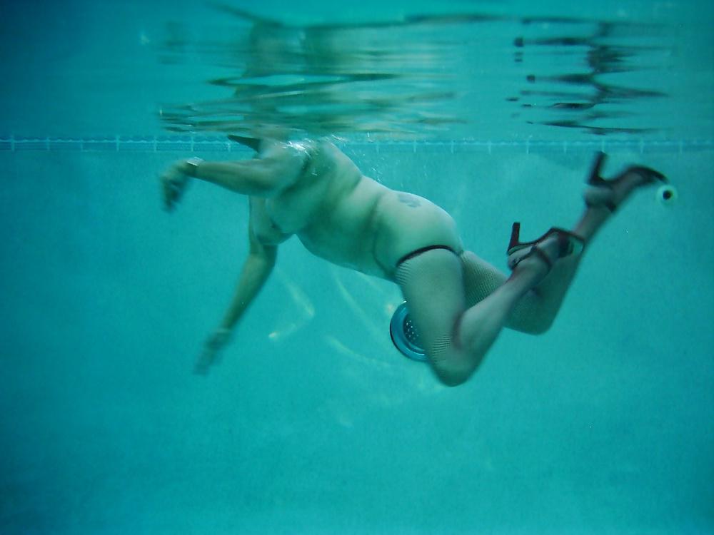 8P With high heels & outfit into the pool