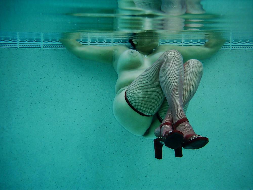 8P With high heels & outfit into the pool
