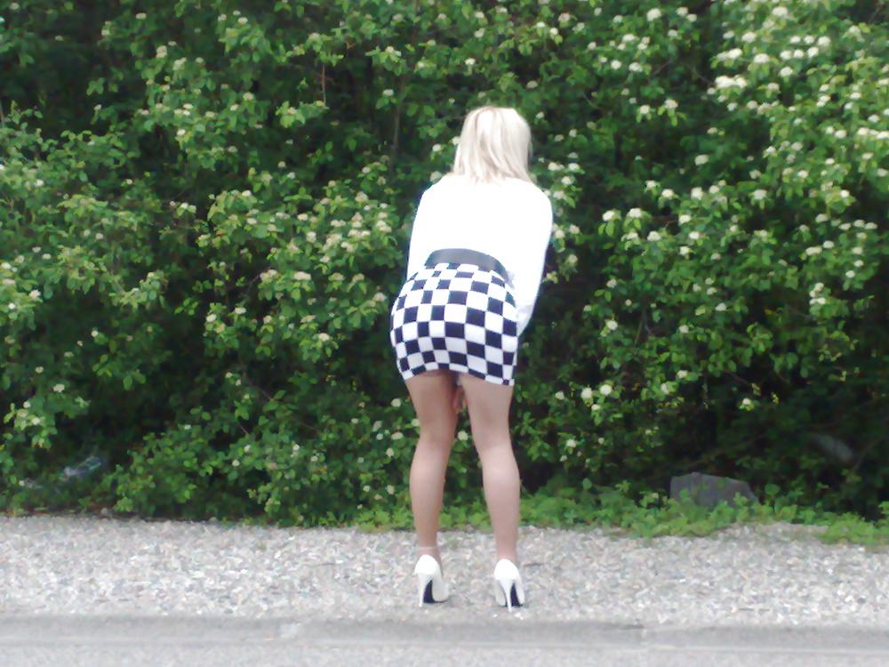 14P Hot blonde slut posing outdour