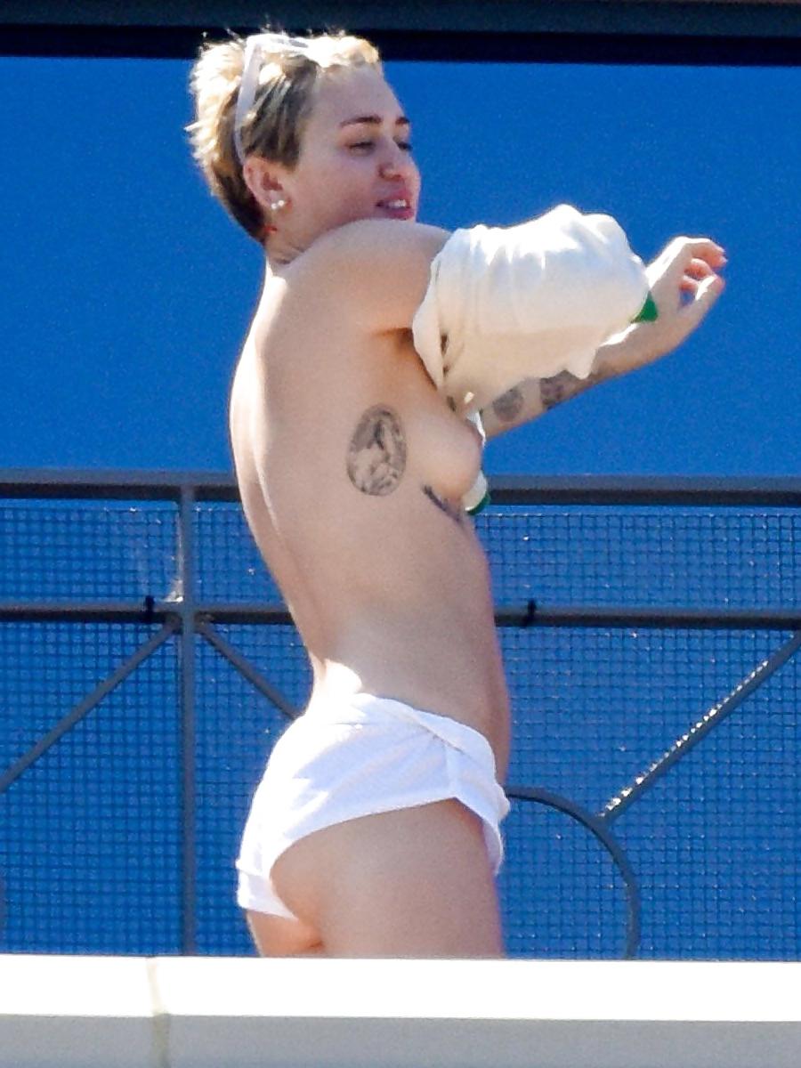 16P Miley Cyrus - topless sunbathing in Sydney, October 2014