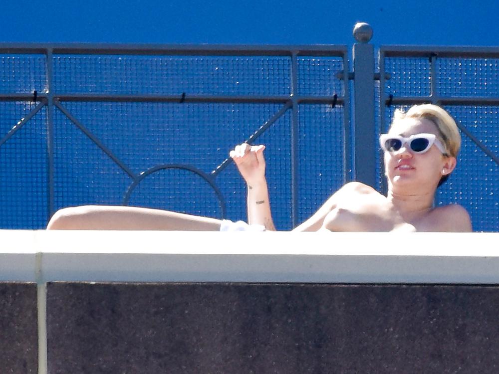 16P Miley Cyrus - topless sunbathing in Sydney, October 2014