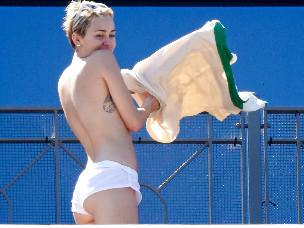 16P Miley Cyrus - topless sunbathing in Sydney, October 2014