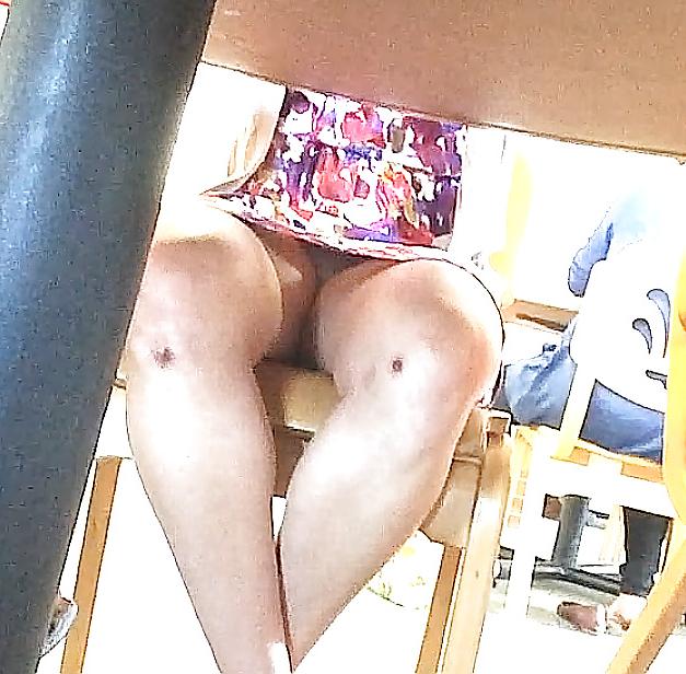 8P Under table upskirt of innocent church going cutie