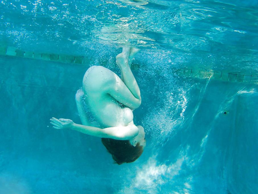 15P Heather Carolin dives in swimming pool 