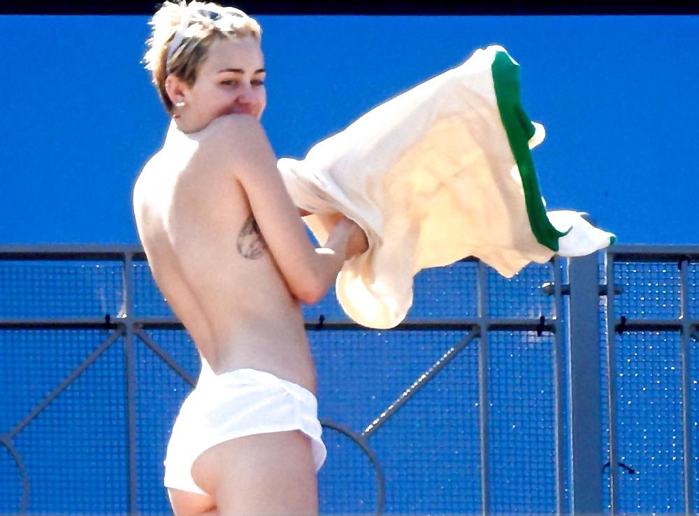 10P Miley Cyrus Topless Sunbathing 