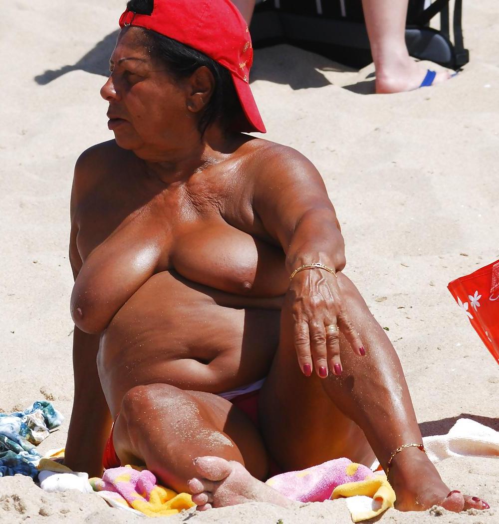 20P Older women sunbathing.