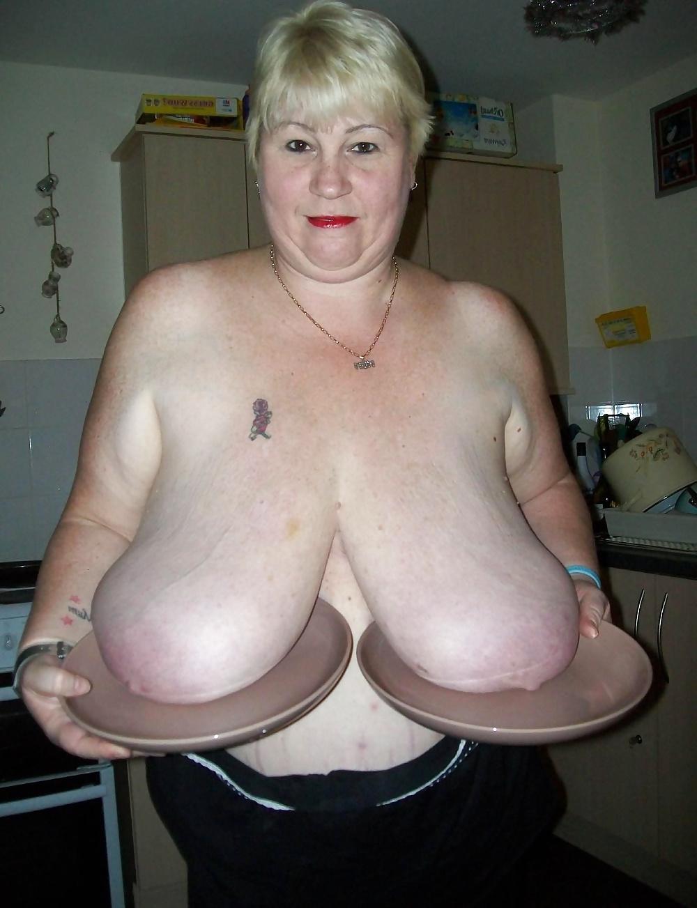 25P Breasts resting on a table...