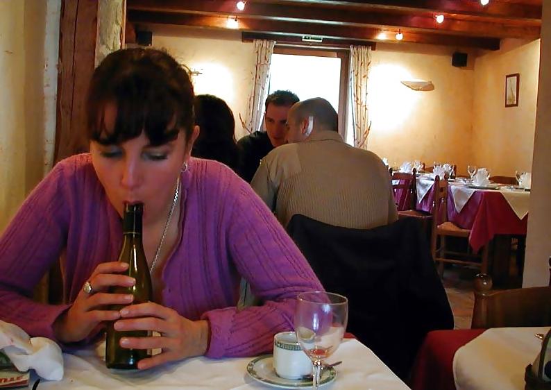 25P 123 - FRENCH NADINE inserting a bottle in public 2002