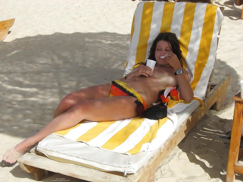 10P A mature sunbathing (delicious tits)