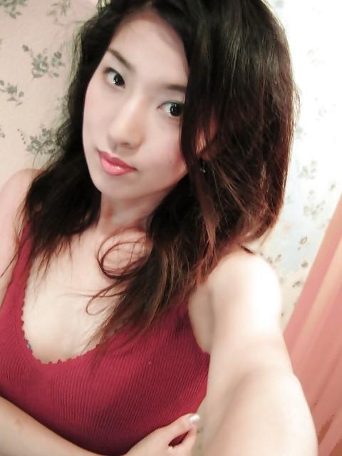 13P Sexy taiwanese girl spreading pussy