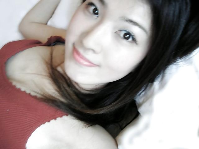 13P Sexy taiwanese girl spreading pussy