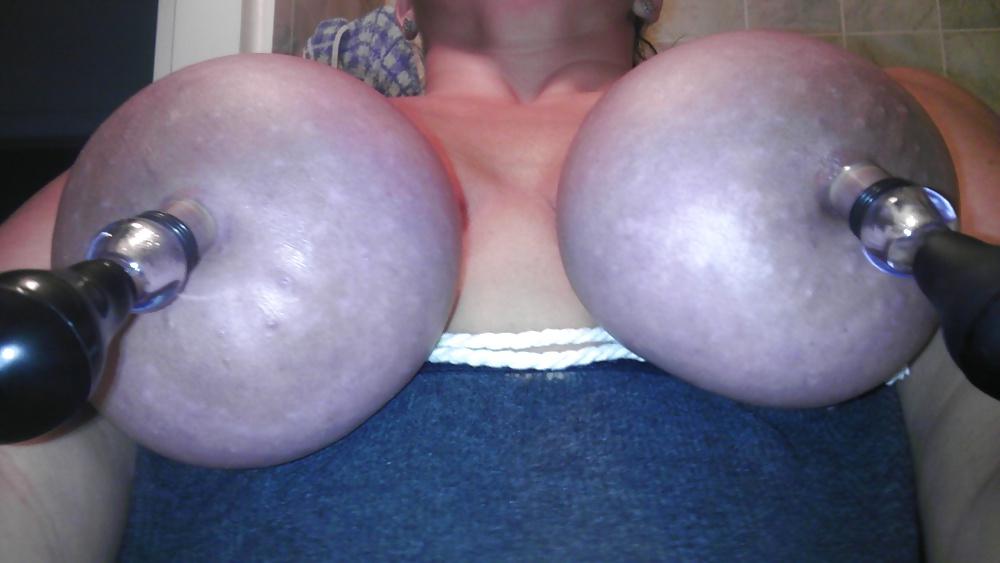 15P Tied up big tits with pumped nips