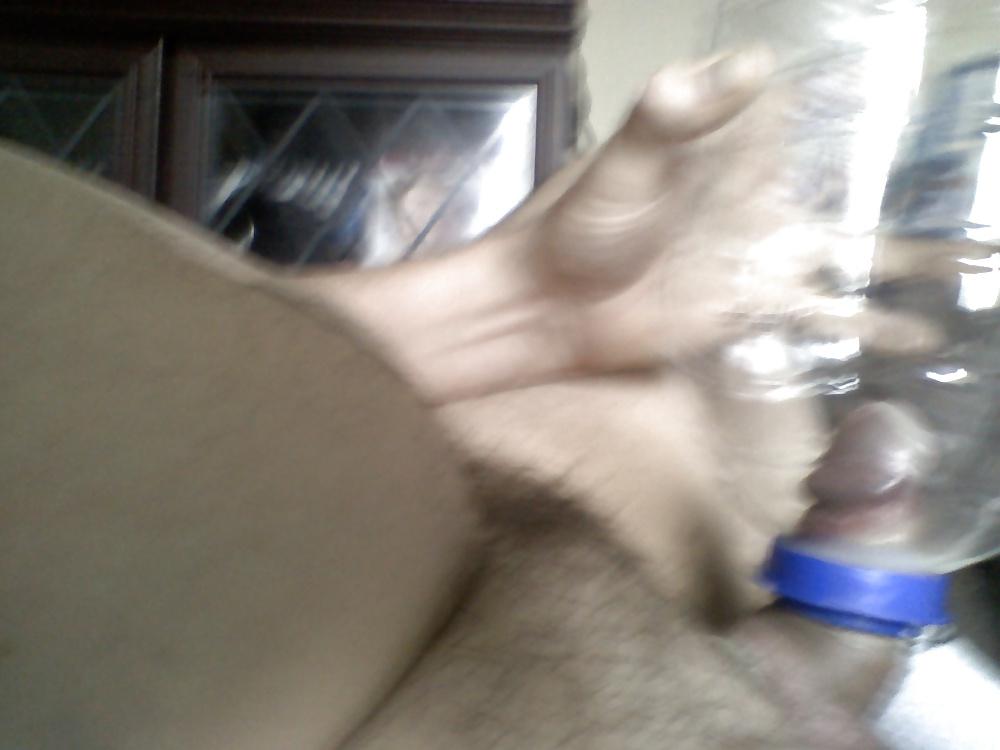 23P Me fucking a bottle and wanking my cock with it 