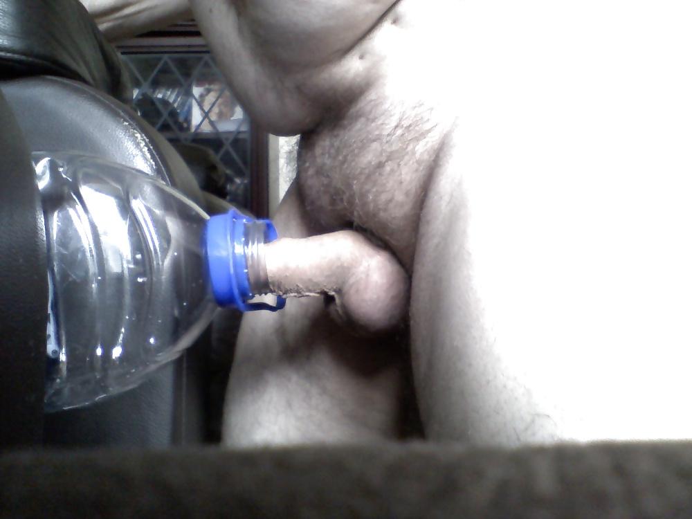 23P Me fucking a bottle and wanking my cock with it 