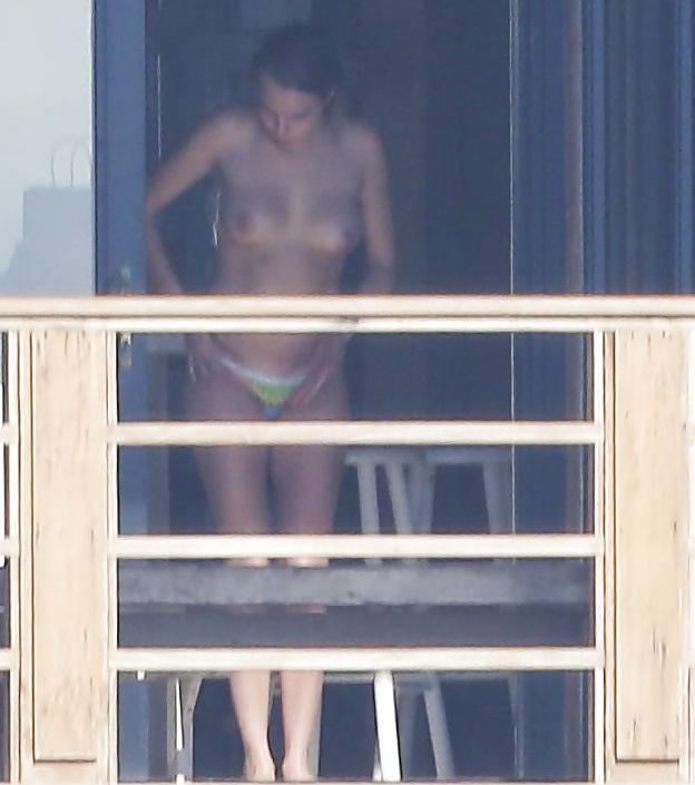 12P Cara Delevingne Sunbathing Topless