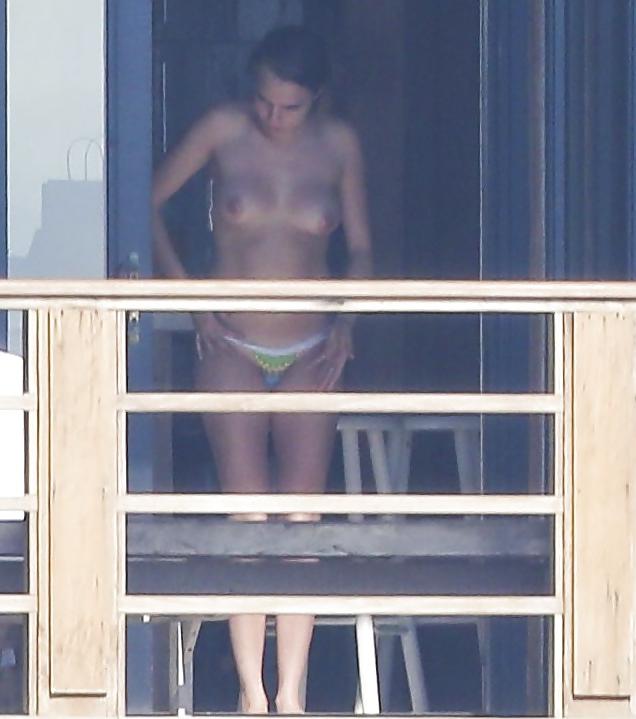12P Cara Delevingne Sunbathing Topless