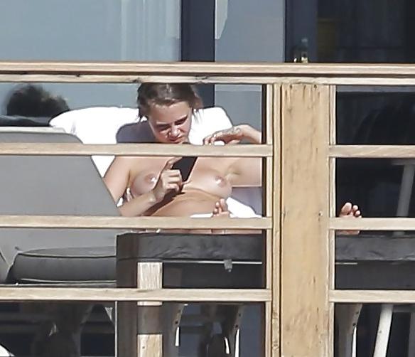 12P Cara Delevingne Sunbathing Topless