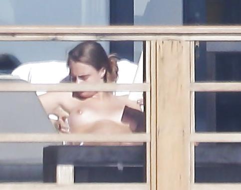 12P Cara Delevingne Sunbathing Topless