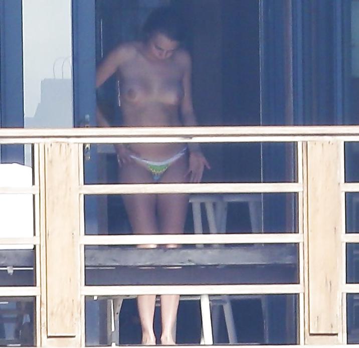 12P Cara Delevingne Sunbathing Topless