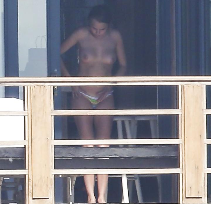 12P Cara Delevingne Sunbathing Topless
