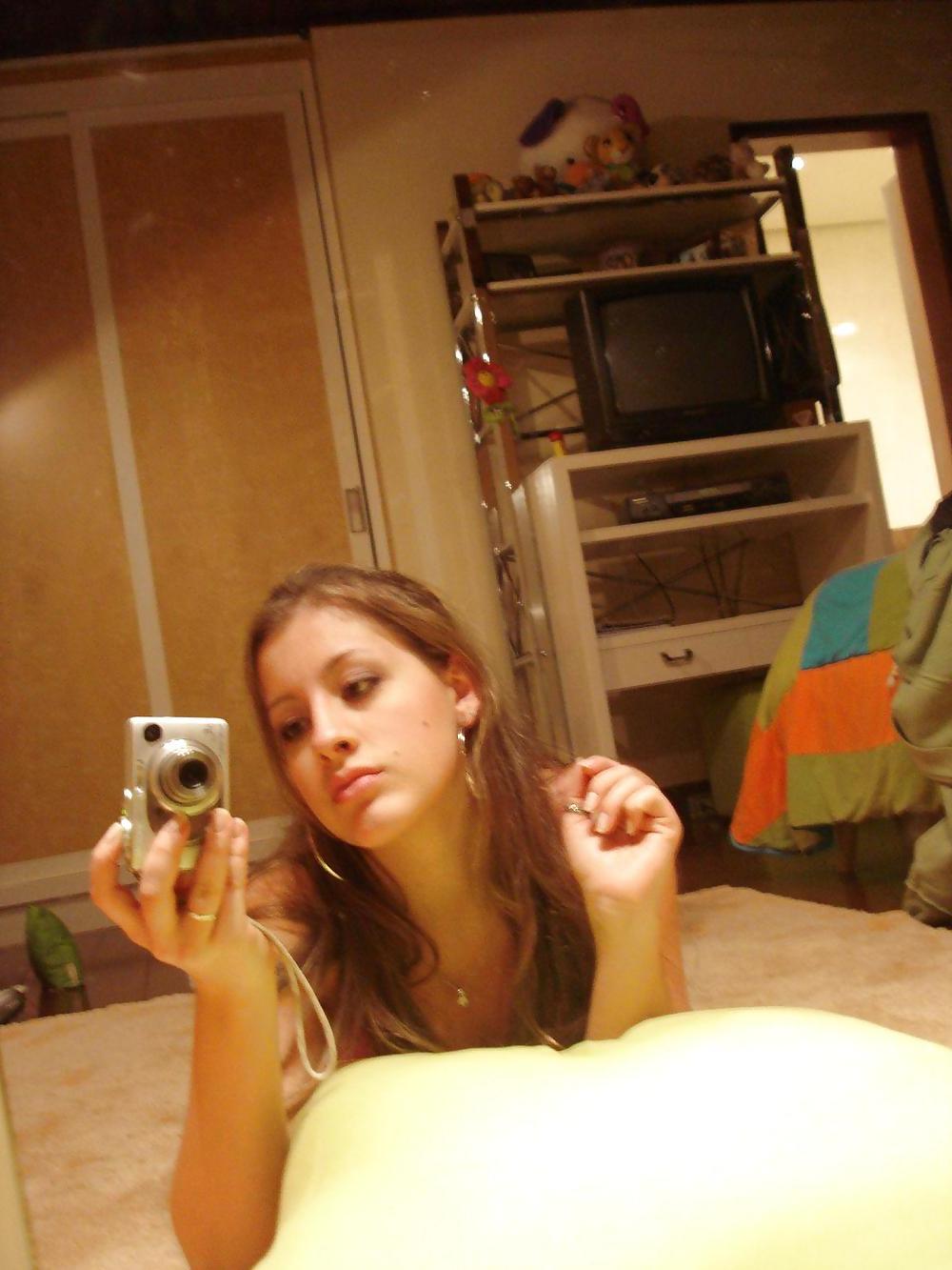 25P Exotic cute posing at home OMG she is hot