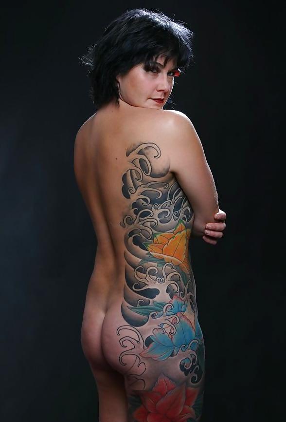15P Extrem Tattoo and Piering - back