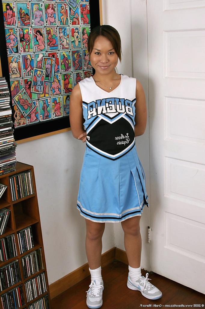 16P Latina first timer revealing tiny tits and tight ass beneath cheer outfit