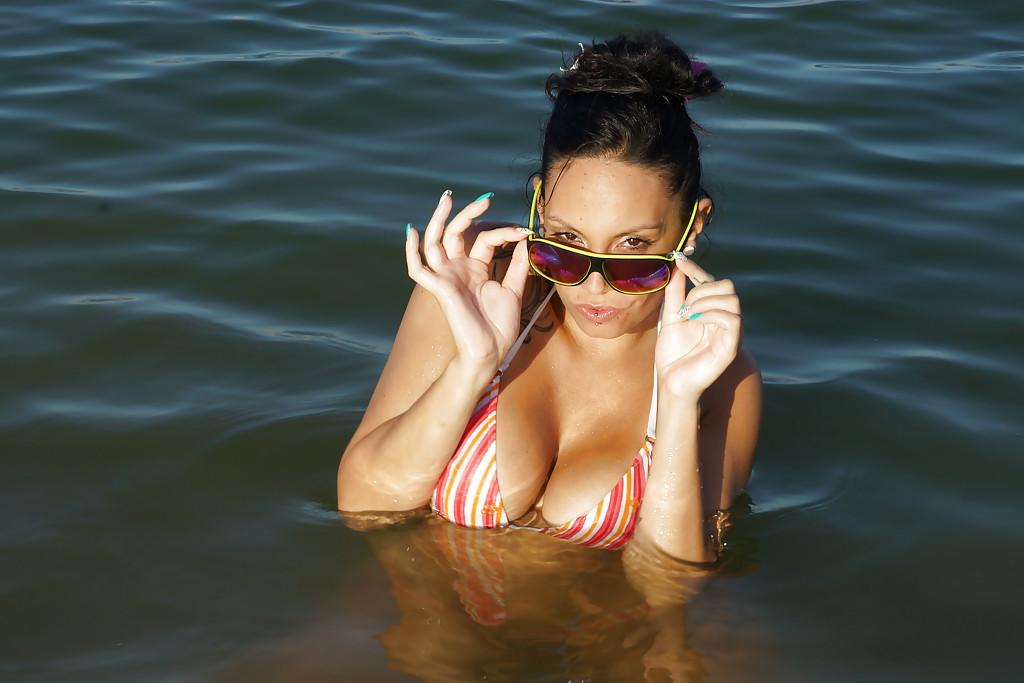 16P Tanned brunette Marta Sanz demonstrates her big boobies in the ocean