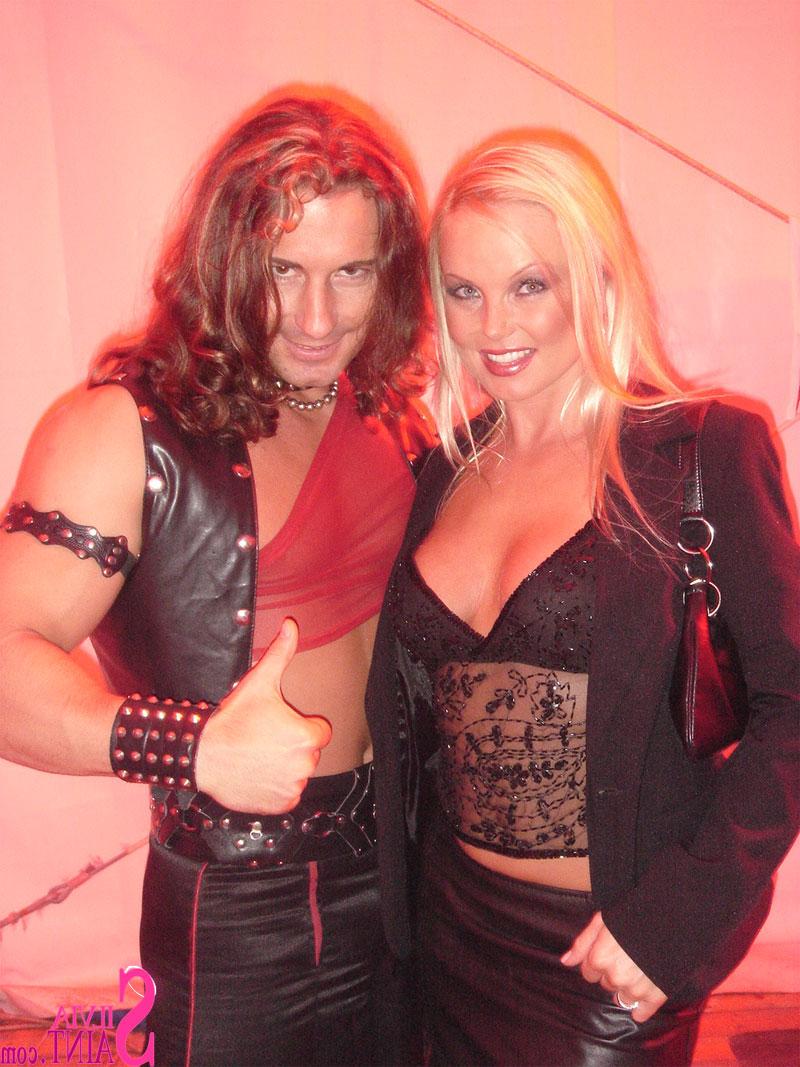 15P Blonde MILF Silvia Saint fully clothed posing & flaunting big tits at party