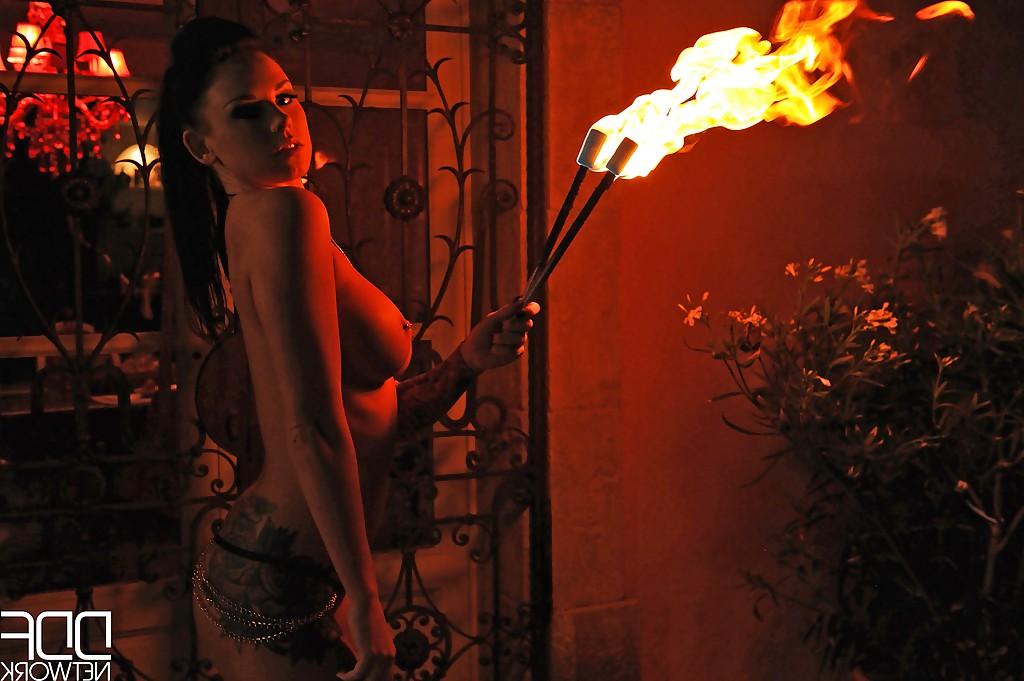 16P European fire breather Daniella Mae displaying big tits and pierced nipples