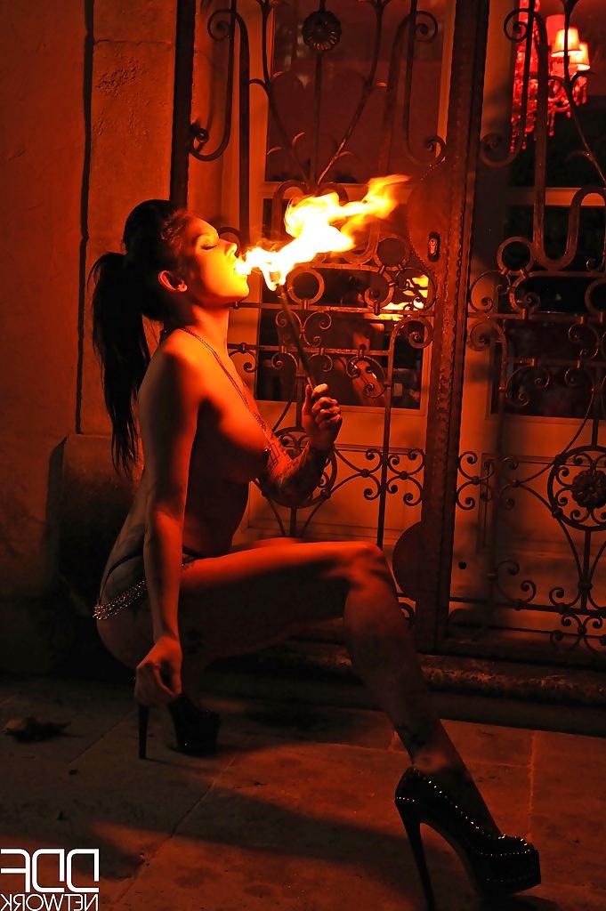 16P European fire breather Daniella Mae displaying big tits and pierced nipples