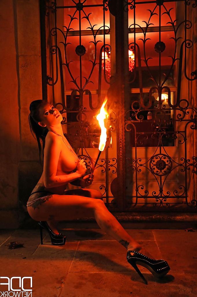16P European fire breather Daniella Mae displaying big tits and pierced nipples