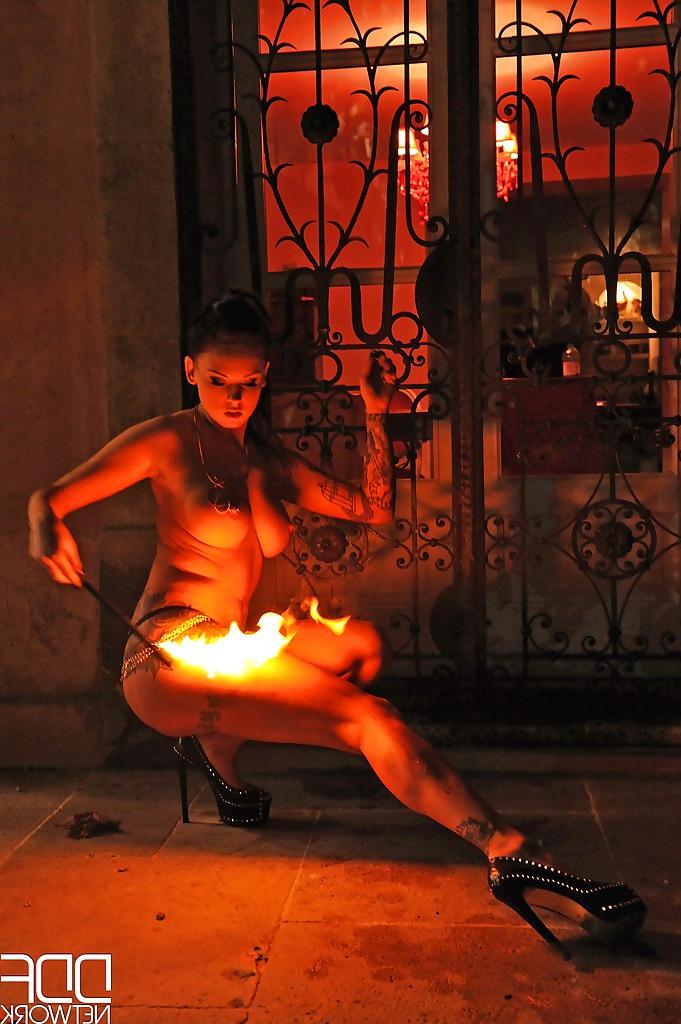 16P European fire breather Daniella Mae displaying big tits and pierced nipples