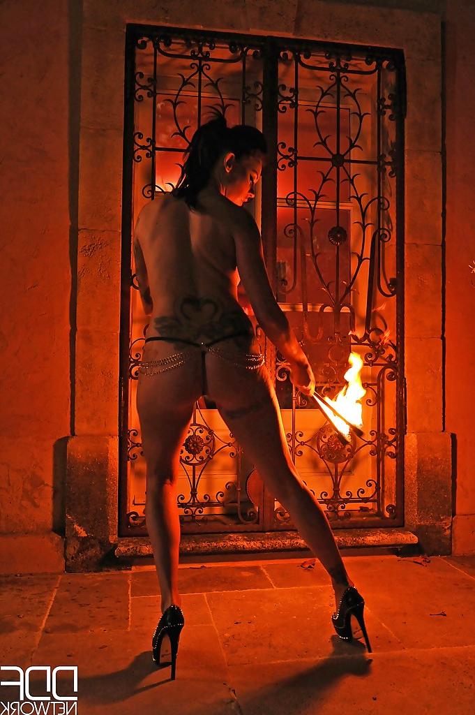 16P European fire breather Daniella Mae displaying big tits and pierced nipples