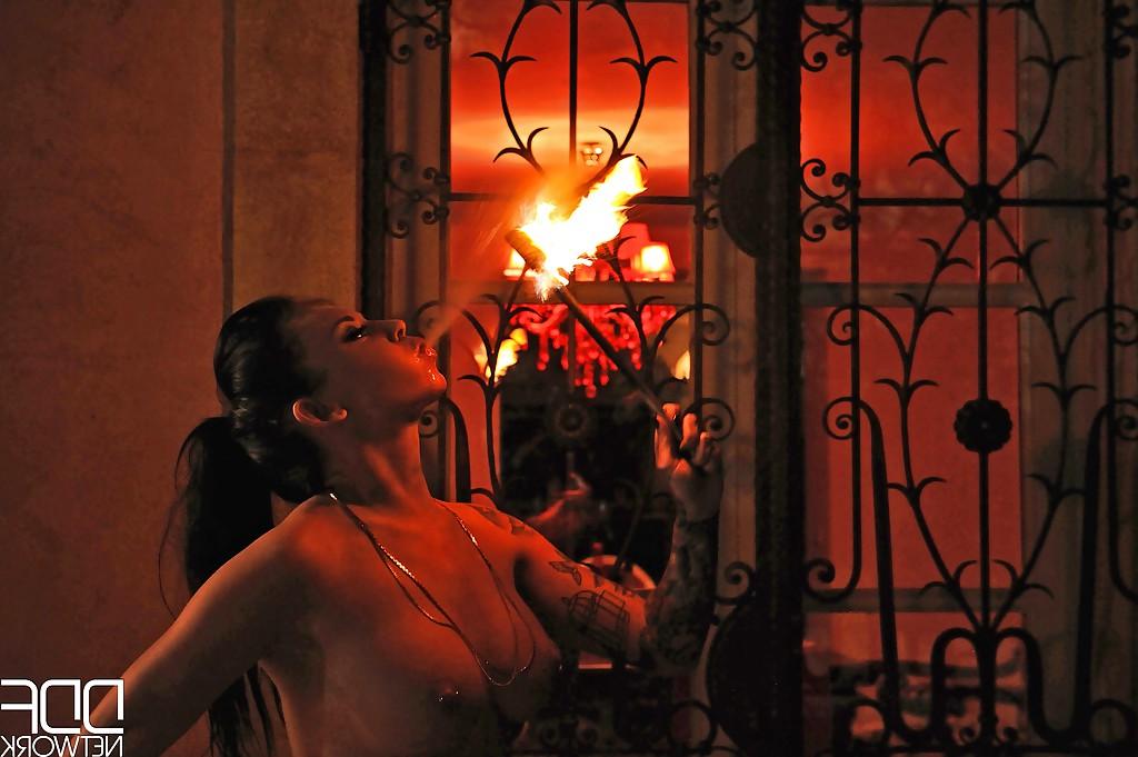 16P European fire breather Daniella Mae displaying big tits and pierced nipples