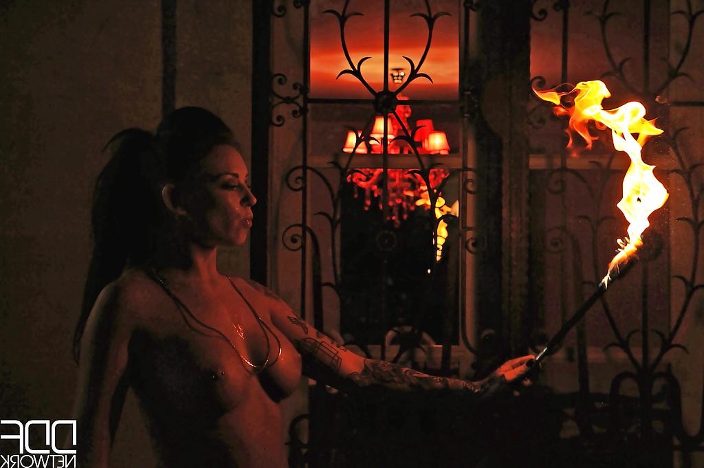 16P European fire breather Daniella Mae displaying big tits and pierced nipples