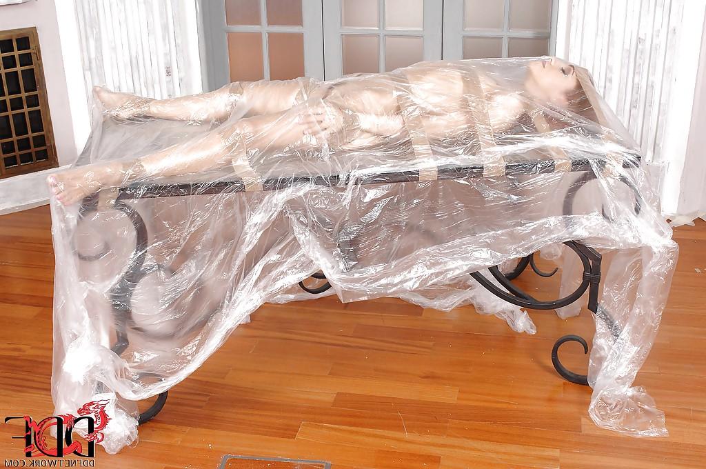 12P Seductive BDSM chick posing overwrapped and sticky tape-bound