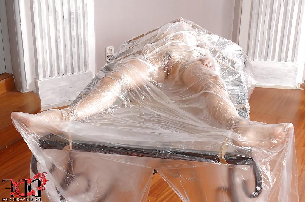 12P Seductive BDSM chick posing overwrapped and sticky tape-bound