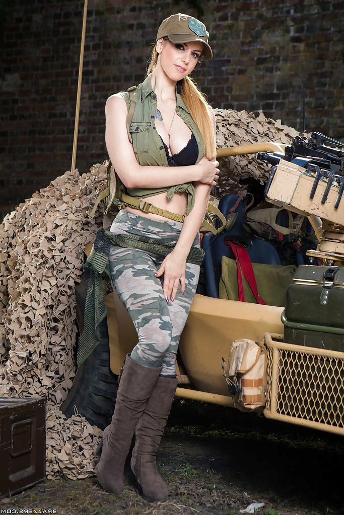 16P Pornstar Stella Cox letting big natural tits loose from military garb