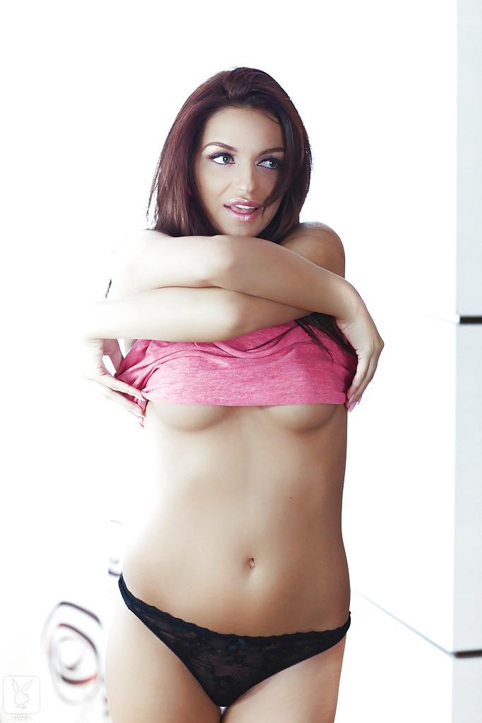 16P Petite brunette cutie slipping off her pink tank and thong panties