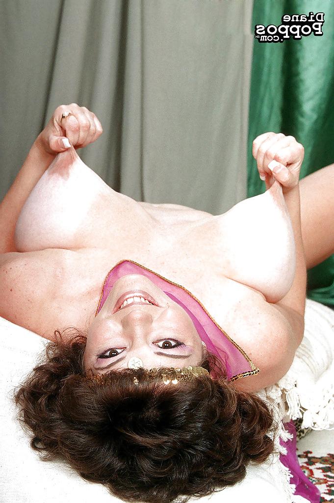 16P Mature Greek woman Diane Poppos letting big hanging tits fall free