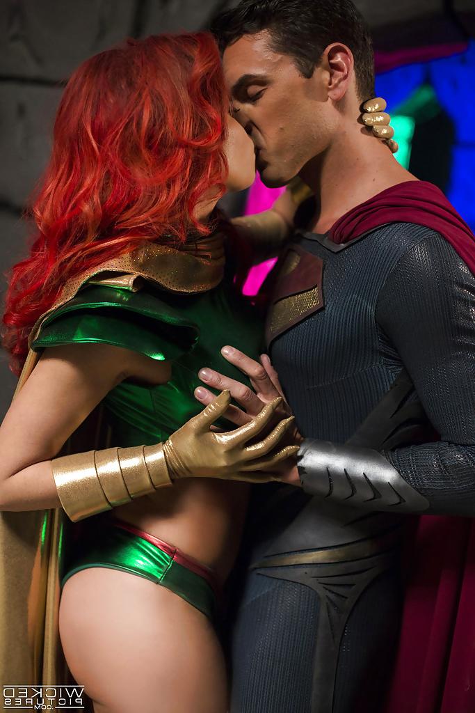 16P Chesty cosplay redhead Britney Amber taking a cumshot on her tongue